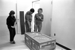 Gloria Cranmer Webster, with Andrea Laforet and John Veillette, at U’mista Cultural Centre, unpacking boards sent from the Museum of Civilization, ca. 1980.