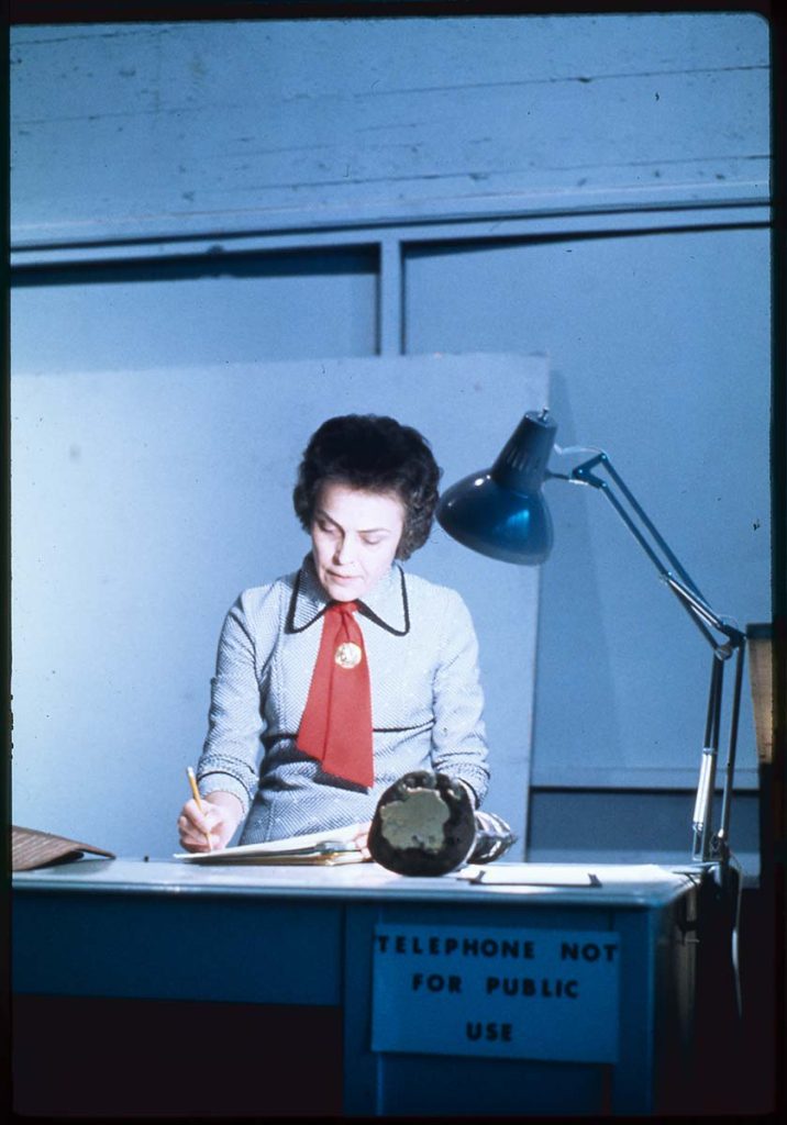 Gloria Cranmer Webster working at MOA in its former location in the basement of UBC Main Library, ca. 1971.